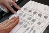 Чип с отпечатками пальцев в документах будет у всех казахстанцев к 2025 году